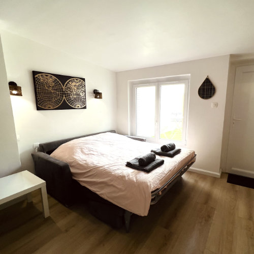 Salon et canapé déplié en lit